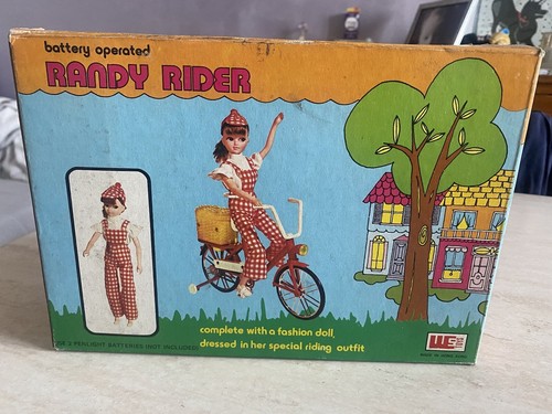 Rarissima bambola con bici